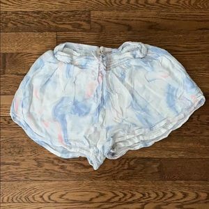 Flowy marbled white, pink, and blue beach shorts